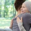 Young happy couple hugging after hearing the good news